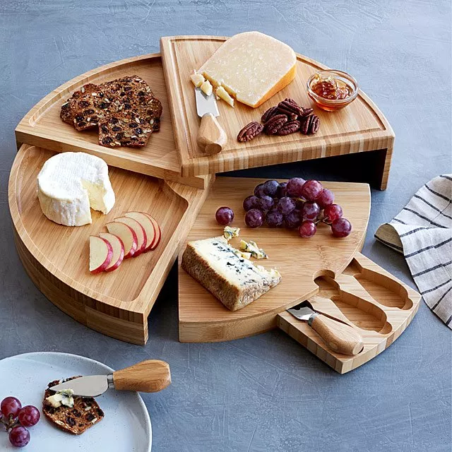 Inexpensive Hostess Gifts 2023: Swivel Cheese Board 2023
